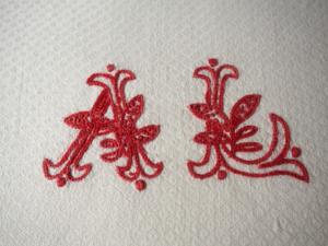 Monogramme ancien AL sur serviette